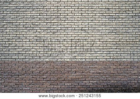 Two-tone Gray-brown Wall Texture Made Of Small Bricks. A Discreet Background. A Place For A Label.