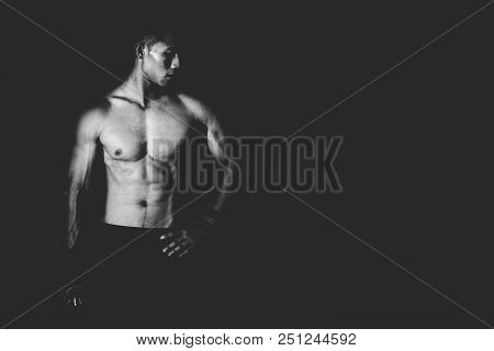 Strong Athletic Man Showing Muscel In Local Gym