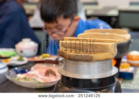 Image Of Traditional Wooden Rice Pot Lid In Japanese Style Ryokan Restaurant.