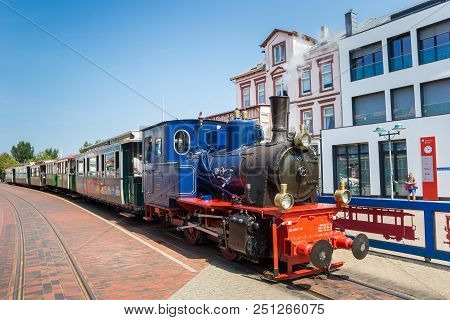 Borkum, Germany - July 25, 2018: Historic Steam Train In The Center Of Borkum Village In Germany