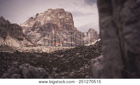 Riffugio In Dolomites Valley, Italy. Mountains In The Background