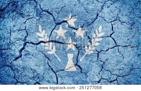Kosrae, Island In Micronesia, Flag On Dry Earth Ground Texture Background