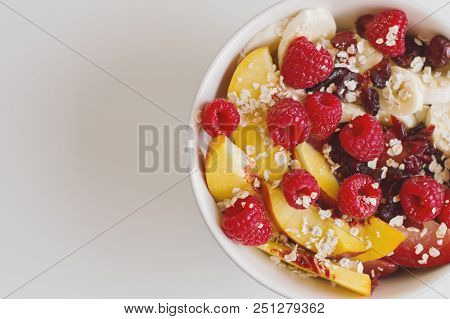 Salad With Nectarine, Banana, Raspberry, Dried Cranberry, Plum And Quick Cook Oats In A Bowl. Breakf