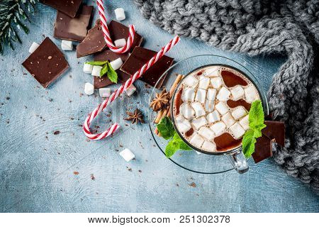 Homemade Hot Chocolate With Mint, Candy Cane And Marshmallow, Light Blue Background With Warm Blanke
