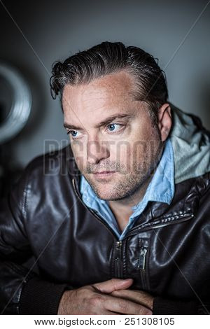 Portrait Of A Handsome Man In A Lether Jacket