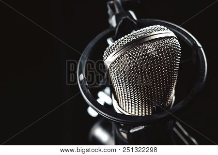 Professional Studio Condenser Microphone On Black Background