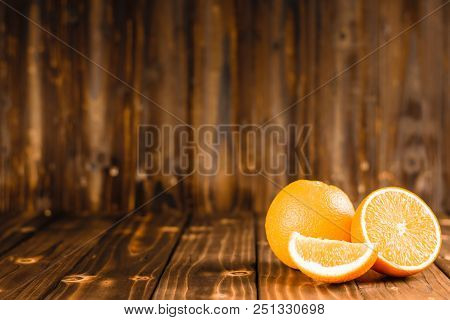 Mandarin Orange On Wood Black Ground Copy Space