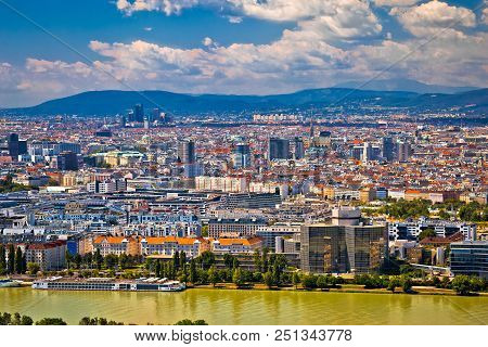 Dandube River And Vienna Cityscape View, Capital Of Austria