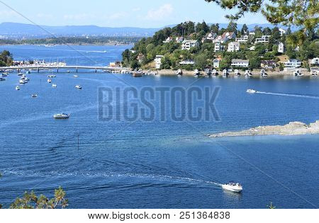 Oslo, Norway - July 22, 2018: View To Oslo Fjord. Two Islands Ormoya And Malmoya Connected To The Ma