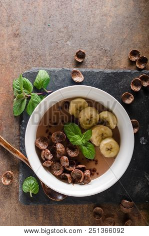 Chocolate Pudding, Banana And Herbs In