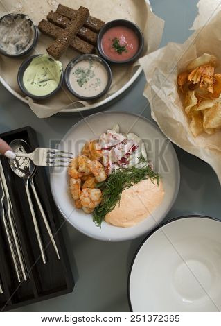 Snacks For Beer. Shrimp, Sauce, Chips, Toast. Top View With Copy Space
