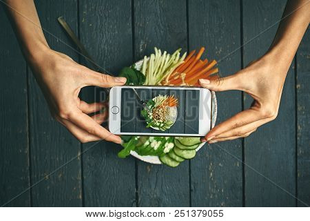 Woman Taking Pictures Buddha Bowl With Vegan Food, Fried Chickpeas, Rice Noodles With Wegetables On 