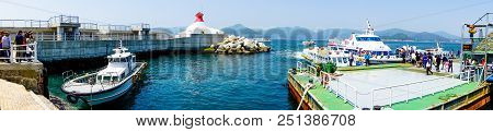 South Gyeongsang, South Korea - April 28, 2018 : Ferry Wharf And Lighthouse Of Oedo Botania Island I
