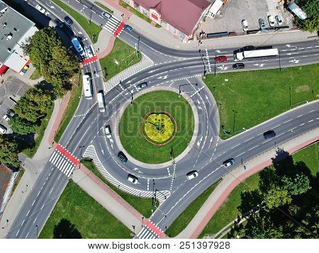 Roundabout Intersection In Three Directions With Island, Aerial View.