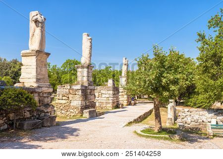 Ruined Statues On The Agora, Athens, Greece. Scenic View Of Historical Park In Athens Center. Ancien