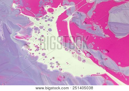 Abstraction Of The Flowing Multi-colored Acrylic Paints