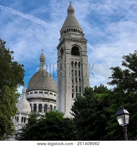 The Basilica Sacre Coeur Is A Roman Catholic Church Located At The Summet Of The Butte Montmartre , 