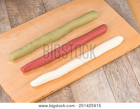 The Cooking Step Of Making Japanese Dango Dessert With 3 Different Color In Pink(red), White, And Gr
