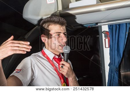 Marmaris, Turkey - May 19, 2018: Male Tour Guide With A Microphone In The Bus In Evening Time