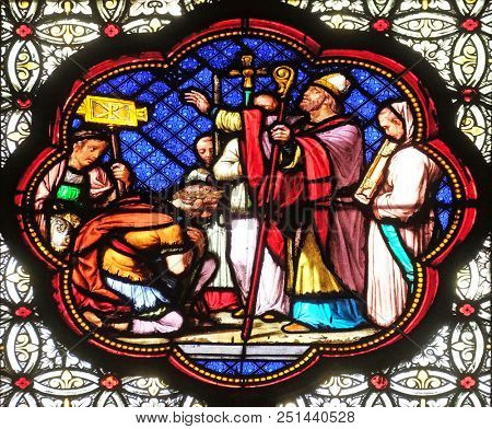 PARIS, FRANCE - JANUARY 05: Baptism of Constantine after his victory over Maxentius, stained glass window in the Basilica of Saint Clotilde in Paris, France on January 05, 2018.