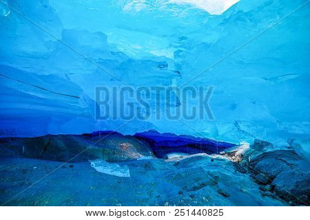 Blue Ice Cave Of Svartisen Glacier In Norway