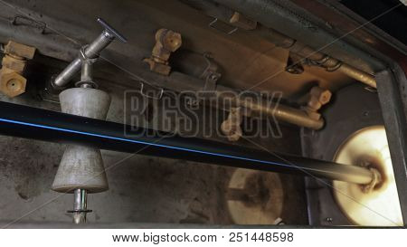 Pipes Manufacturing Production Line. Manufacture Of Plastic Water Pipes Of The Factory. Process Of M
