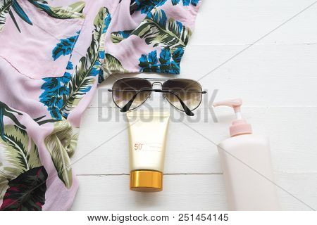 Natural Cosmetics For Skin Face Sunscreen Spf50 ,body Lotion ,sunglasses And Shirt Of Lifestyle Woma