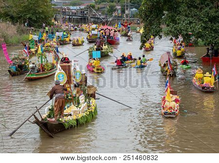 Ayutthaya, Thailand - July 27, 2018 : Buddhists Do Candle Festival Parade By Boat At Ladchado Canal 