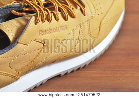 Kiev, Ukraine - May 30, 2018: Reebok Photo Of A Brown Sneaker On The White Soles Behind The Close-up