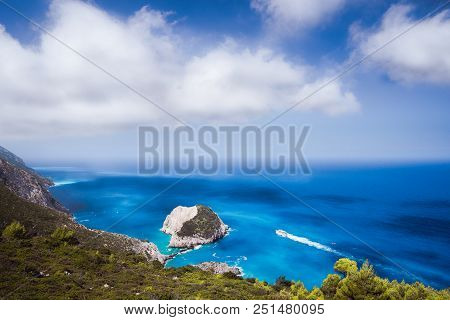 Zante Fantastic Coastal View With White Cliff And Azure Sea Water. White Tourist Ship Sailing Full S