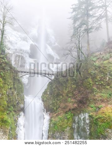 Icy Multnomah Falls Oregon In Wintertime