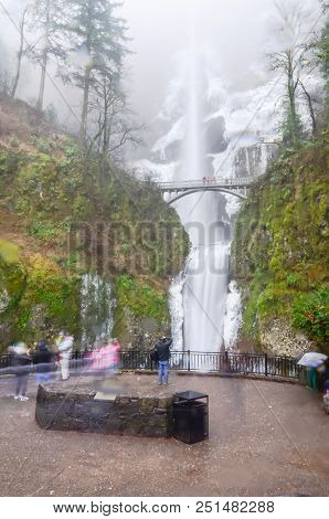 Main Lookout Of Icy Multnomah Falls Oregon In Wintertime