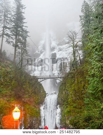 Main Lookout Of Icy Multnomah Falls Oregon In Wintertime