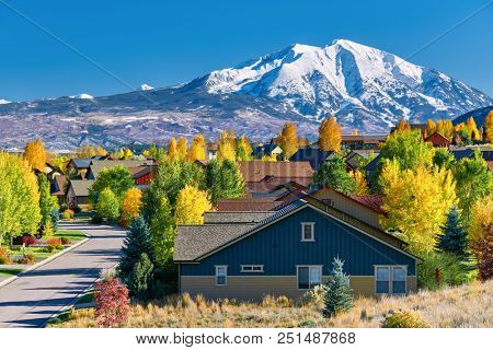 Residential neighborhood in Colorado at autumn, USA. Mount Sopris landscape.