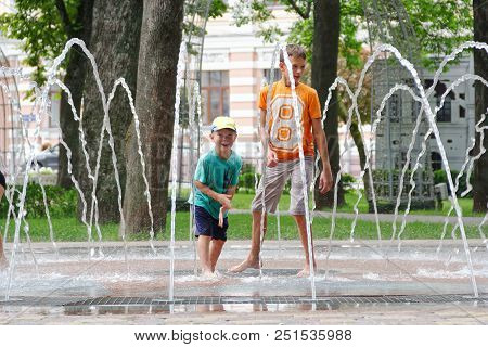 Gomel, Belarus Children Bathing In The Fountain. Square Named After Gromyko