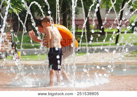Gomel, Belarus Children Bathing In The Fountain. Square Named After Gromyko
