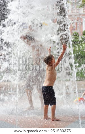 Gomel, Belarus Children Bathing In The Fountain. Square Named After Gromyko