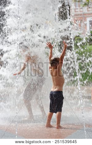 Gomel, Belarus Children Bathing In The Fountain. Square Named After Gromyko