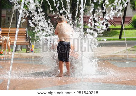 Gomel, Belarus Children Bathing In The Fountain. Square Named After Gromyko