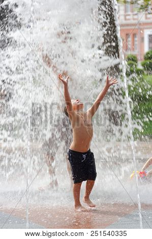 Gomel, Belarus Children Bathing In The Fountain. Square Named After Gromyko