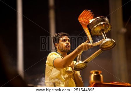 VARANASI, UTTAR PRADESH, INDIA - JULY 6, 2018: Ganga Aarti ceremony at Dasashvamedh Ghat with thousand of prayers each evenning.