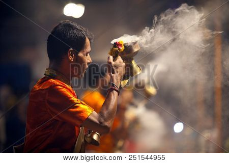VARANASI, UTTAR PRADESH, INDIA - JULY 6, 2018: Ganga Aarti ceremony at Dasashvamedh Ghat with thousand of prayers each evenning.