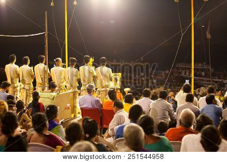 VARANASI, UTTAR PRADESH, INDIA - JULY 6, 2018: Ganga Aarti ceremony at Dasashvamedh Ghat with thousand of prayers each evenning.