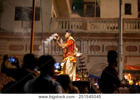 VARANASI, UTTAR PRADESH, INDIA - JULY 6, 2018: Ganga Aarti ceremony at Dasashvamedh Ghat with thousand of prayers each evenning.
