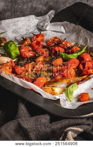 Roasted Cherry Tomotoes. Mediterranean Food Recipe Idea.