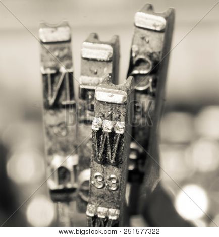 news  word old typwriter hammers  toned image 