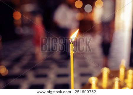 Сandle Burns, In The Christian Temple The Background Is Blurred