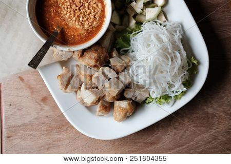 Minced Pork Sausage, Fermented Rice Noodle & Vegetable Served With Chili Sauce. Vietnamese Food Call