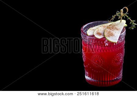 Сurrant Cocktail  On Black Background. Tasty Cocktail With Berries And Apple. Copyspace