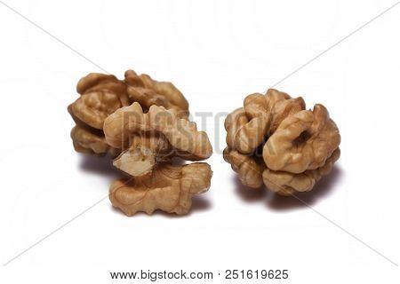 Walnut Kernels Isolated On White Background. Close-up